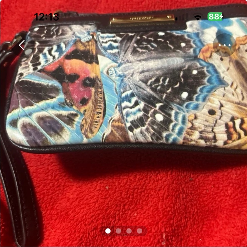 Nine West wristlet brand new butterfly different colors in it very colorful